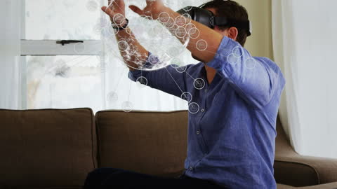 Businessman Using VR Headset with Digital Interfaces