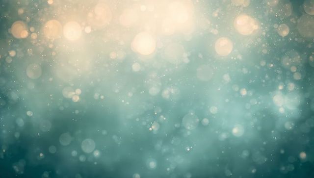 Teal and gold bokeh dreamscape with floating light particles and soft glowing orbs