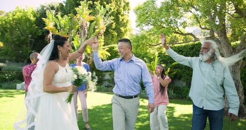 Joyful Multigenerational Wedding Ceremony in Vibrant Garden