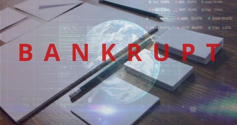 Global bankruptcy warning overlaying office desk with pencil and financial data