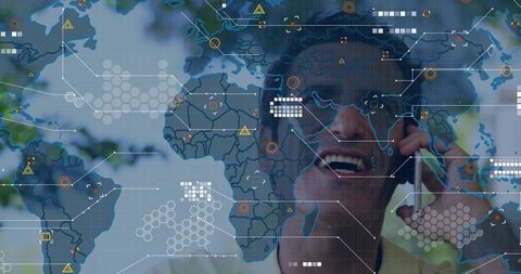 Mature man using smartphone with holographic world map and connected data network overlay