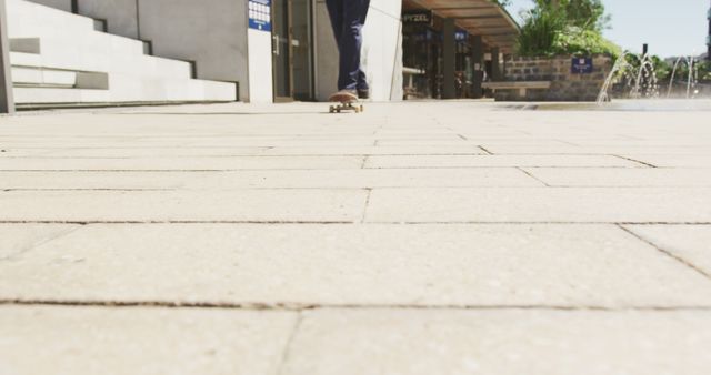 Skateboarder Rolling on Sunny Pavilion - Download Free Stock Images Pikwizard.com