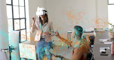 Team exploring augmented reality collaboration with vr headset and holographic interface