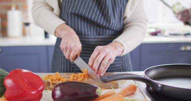 Person Chopping Vegetables in Home Kitchen - Download Free Stock Images Pikwizard.com