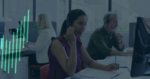 Focused Customer Service Team in Modern Office Environment