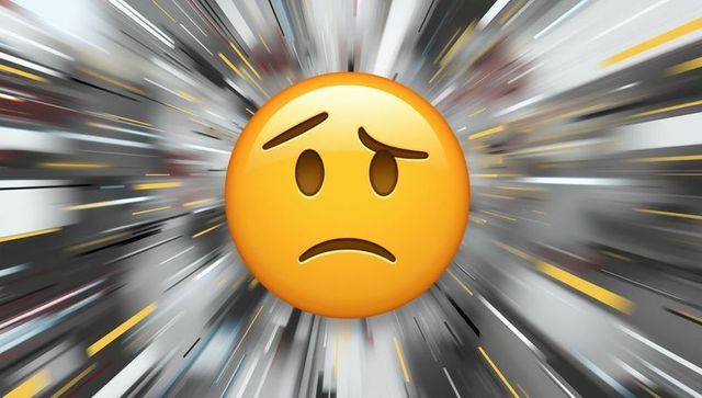Worried emoticon in motion blur digital space