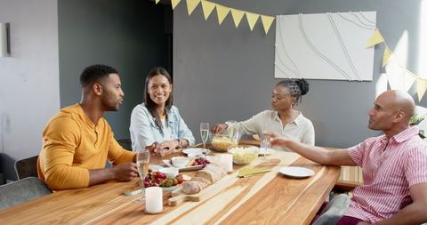 Multiracial Friends Celebrating Birthday at Home Gathering