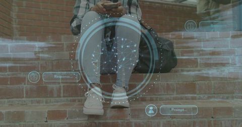 Teen sitting on campus steps using smartphone with augmented reality interface overlay