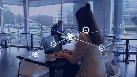 Business Woman Utilizing Digital Networking in Modern Cafe