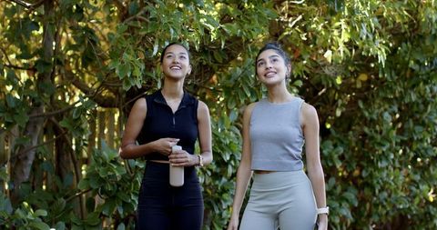 Active Female Friends Enjoying Nature in Comfortable Sportswear