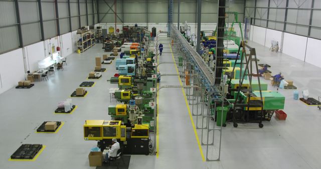 Automated Manufacturing Facility with Industrial Machinery and Workers - Download Free Stock Images Pikwizard.com