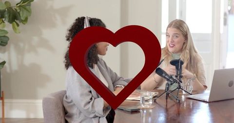 Recording Podcast Conversation Two Hosts with Microphones, Laptop and Red Heart Overlay