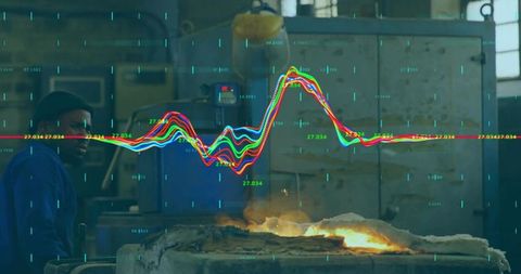 Foundry worker monitoring molten metal with digital data overlay and temperature graphs