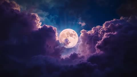 Glowing Full Moon Emerging Amongst Violet Clouds in Indigo Sky
