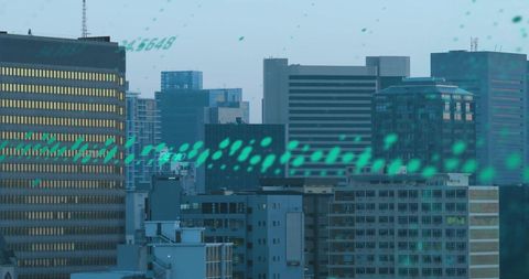 Digital data streams flowing over city skyline