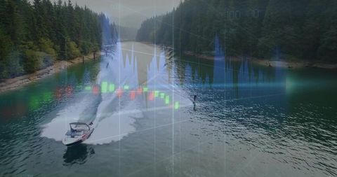 Motorboat towing wakeboarder across forested lake with digital data overlay showing motion