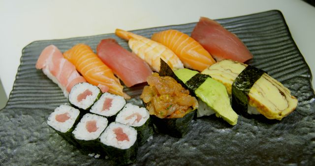 Assorted Nigiri and Maki Sushi on Ceramic Plate - Download Free Stock Photos Pikwizard.com