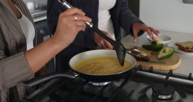 Two Women Cooking Together in Modern Kitchen Preparing Breakfast - Download Free Stock Images Pikwizard.com