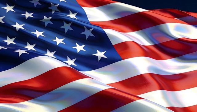 Waving american flag with glossy satin texture and dramatic folds for patriotic design