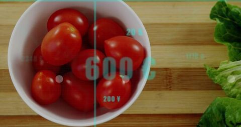 Fresh Tomatoes and Digital Data Interface in Modern Kitchen