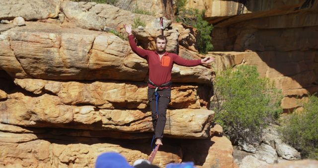 Man Balancing on Tightrope Across Canyon - Download Free Stock Images Pikwizard.com