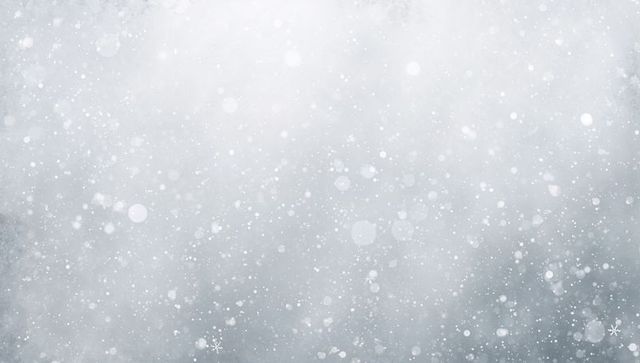 Dreamy winter snowfall bokeh background with soft falling snowflakes and frosty haze