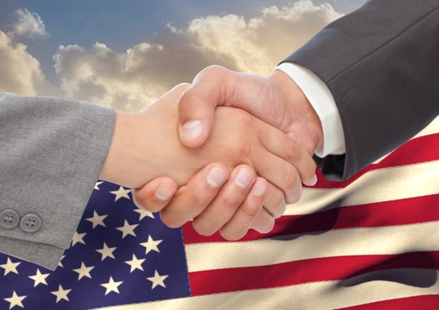 Business Handshake with American Flag Background - Download Free Stock Photos Pikwizard.com