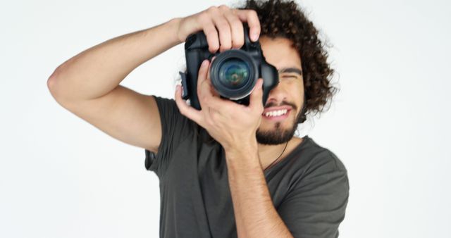 Young Photographer Capturing Moments with Dynamic Style - Download Free Stock Images Pikwizard.com