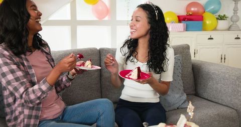 Friends Enjoying Cake and Conversation at Home Cafe