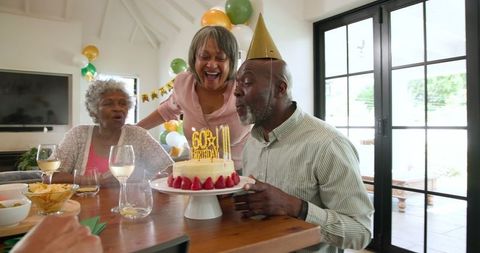 Senior Friends Celebrating Birthday Together with Joy