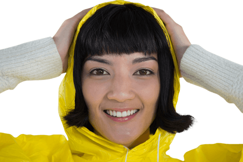 Smiling Woman Wearing Transparent Raincoat Holding Hood