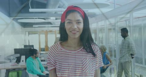 Confident Businesswoman in Modern Office with Digital Overlay