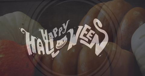 Happy halloween text on assorted pumpkins