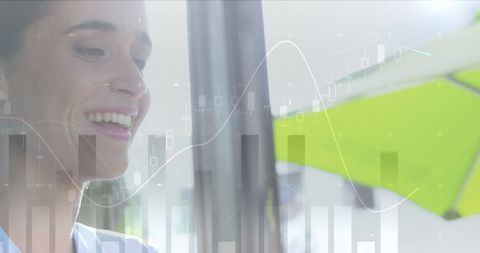 Smiling Professional Analyzing Data with Digital Interface Overlay - Download Free Stock Images Pikwizard.com