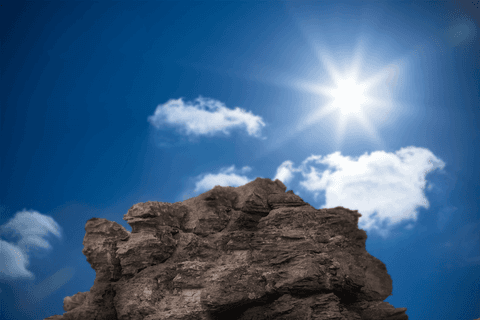 Rock Formation Under Sky With Bright Sunlight on Transparent Background