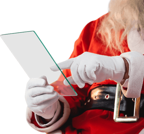 Santa claus interacting with transparent digital screen