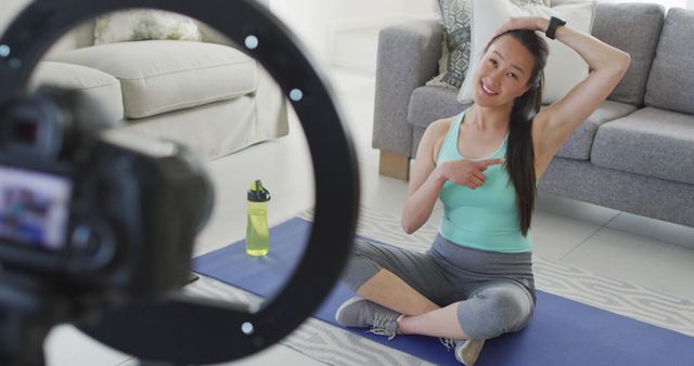 Fitness Trainer Giving Online Exercise Class in Living Room - Download Free Stock Images Pikwizard.com