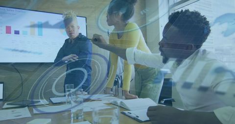 Diverse Team Collaborating on Data Analysis and Strategy Development