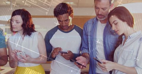 Coworkers collaborating on smartphones with futuristic hud overlay, modern office mobile work