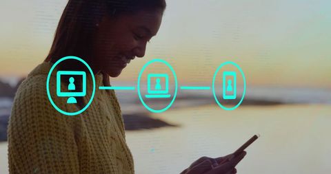 Woman on beach utilizing smartphone connection and communication