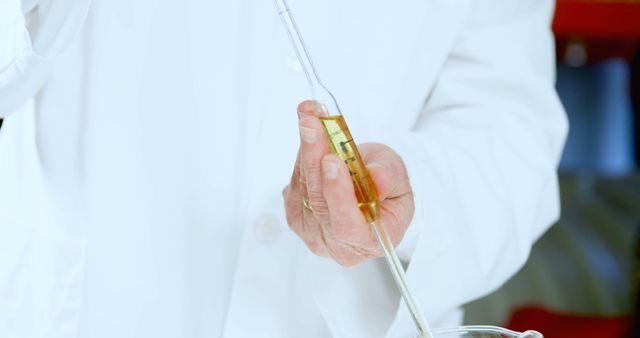 Scientist Performing Liquid Chemical Analysis in Laboratory - Download Free Stock Images Pikwizard.com