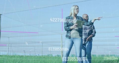 Agritech Team Using Tablet and Pointing in Netted Crop Rows with Augmented Data Overlays