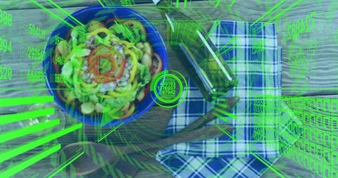 Augmented reality nutrition overlay displaying fresh salad bowl with oil bottle and spoon