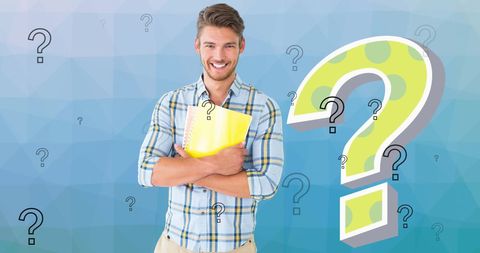 Smiling male teacher holding book with question marks overlay