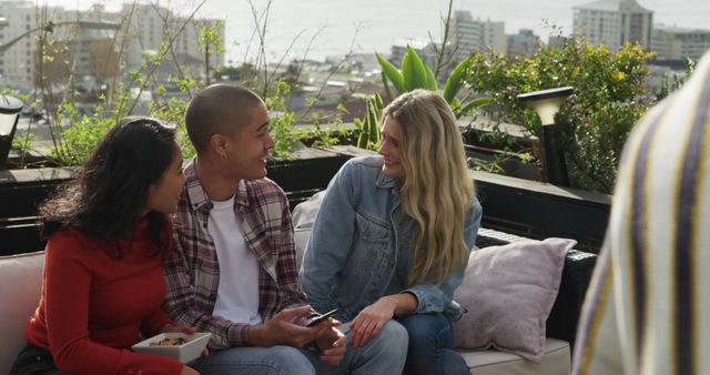 Friends Relaxing on Rooftop Lounge Enjoying Beautiful Day - Download Free Stock Images Pikwizard.com