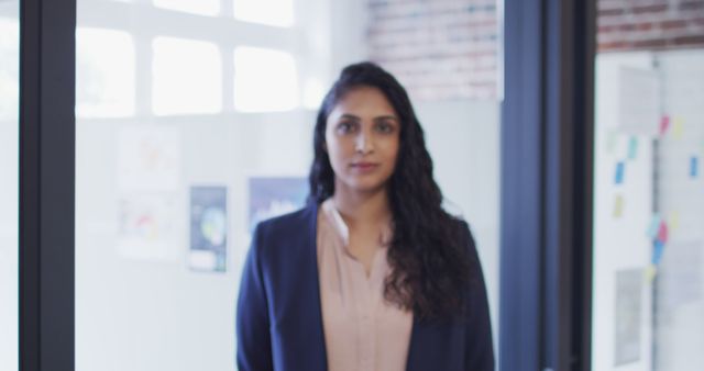 Confident Businesswoman Standing in Creative Office - Download Free Stock Images Pikwizard.com