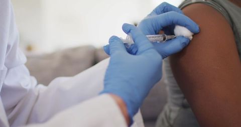 Doctor Administering Vaccine to Patient in Clinical Setting - Download Free Stock Images Pikwizard.com