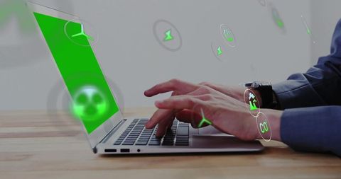 Typing on laptop displaying green eco icons and interactive sustainability interface