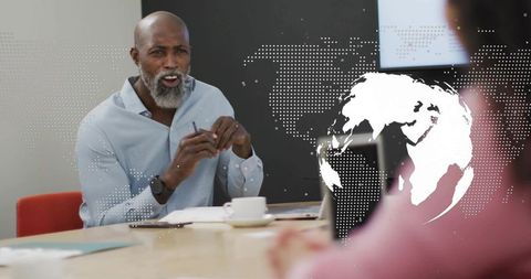 Business Leader Discussing Global Strategy in Modern Office