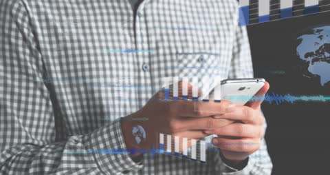 Caucasian Male Analyzing Financial Data on Smartphone
